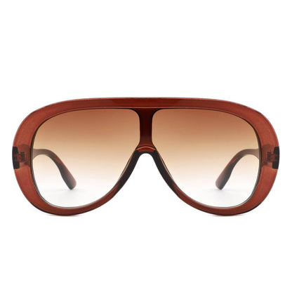 Brown sunglasses with a shield design on a white background